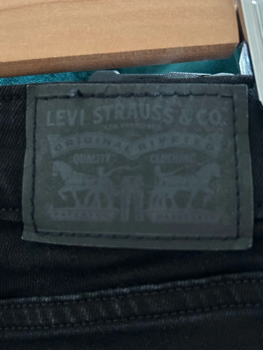 Levi’s Super Skinny size 28 black jeans with faux leather front panels